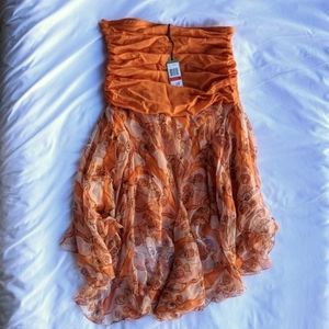 Strapless dress with pattern flowy skirt